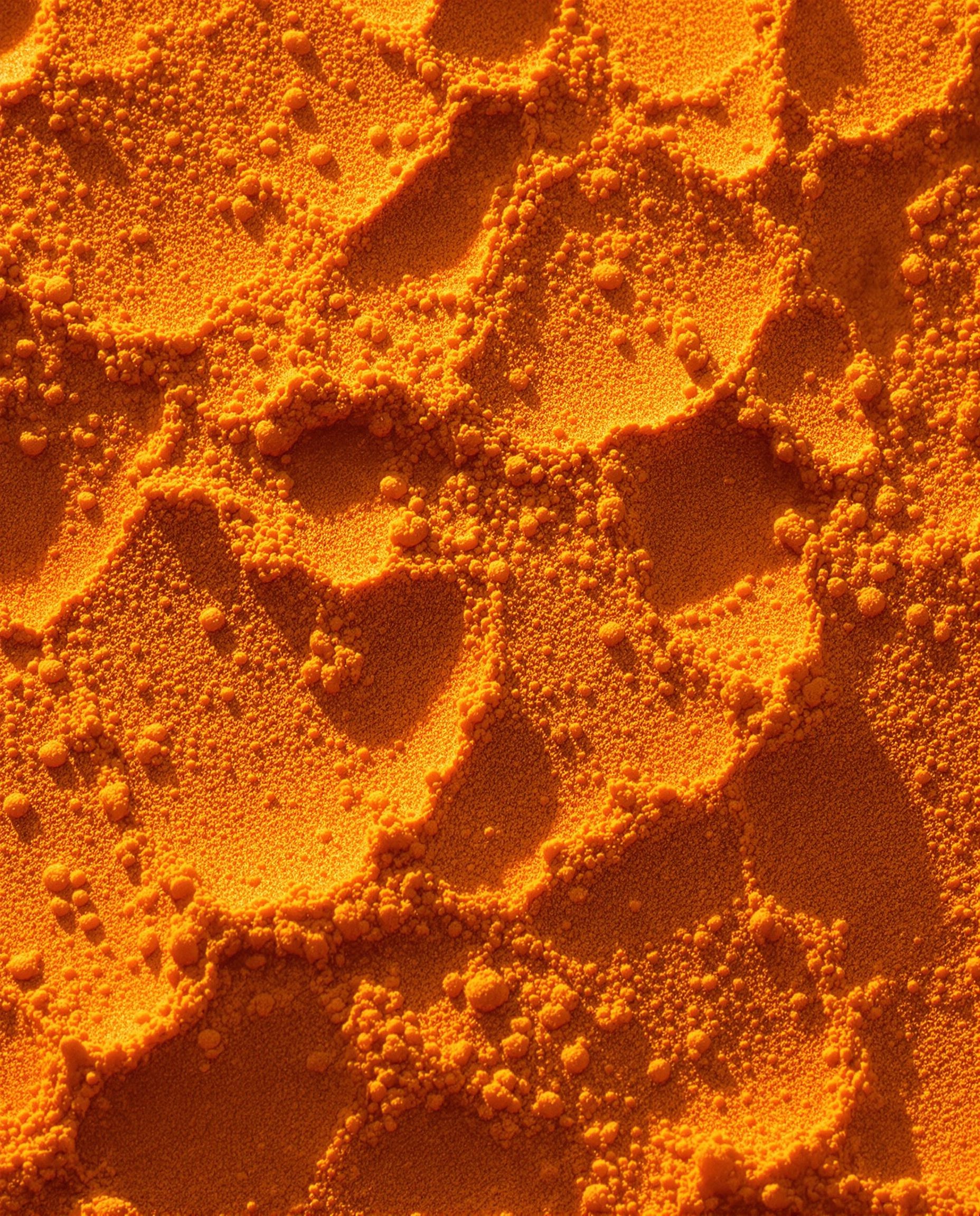 Macro sur pigments PO48 Quinacridone et Terre de Sienne calcinée.