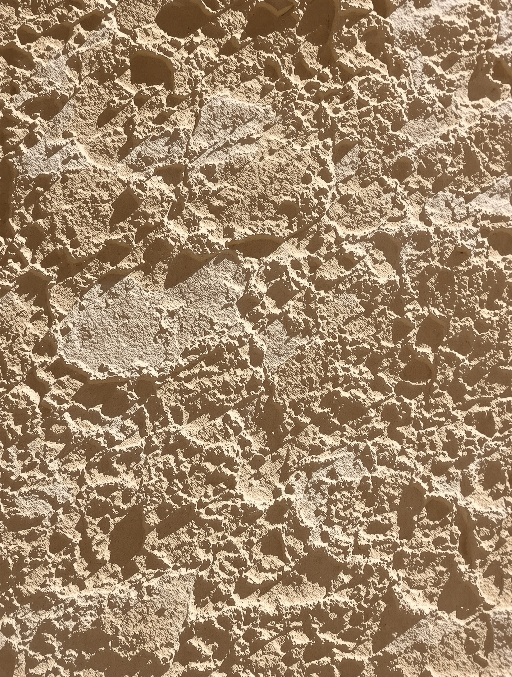 Mur intérieur grec en pierre et enduit à la chaux