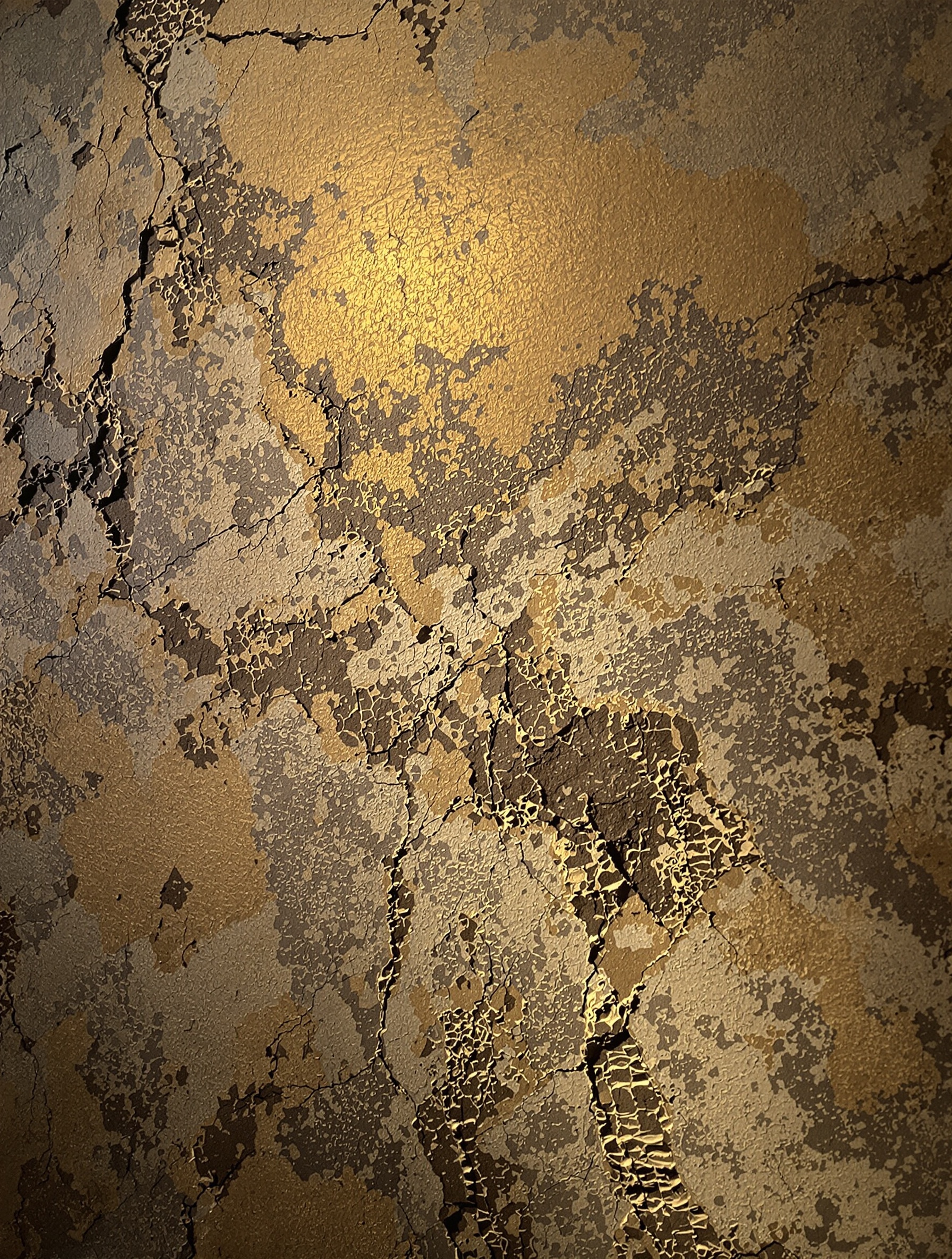 Détail texture mur patiné lumière rasant